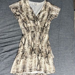 Snake skin dress, above the knee only worn a handful of times.